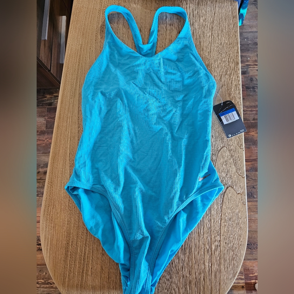 NWT bright blue racerback Nike swimsuit